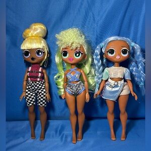 3 L.O.L. Surprise! OMG dolls 1 w/ green hair, 1 w/ blue hair, 1 w/ yellow hair
